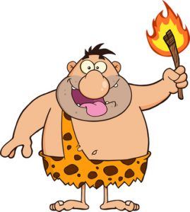 Happy Caveman Cartoon Character Holding Up A Fiery Torch